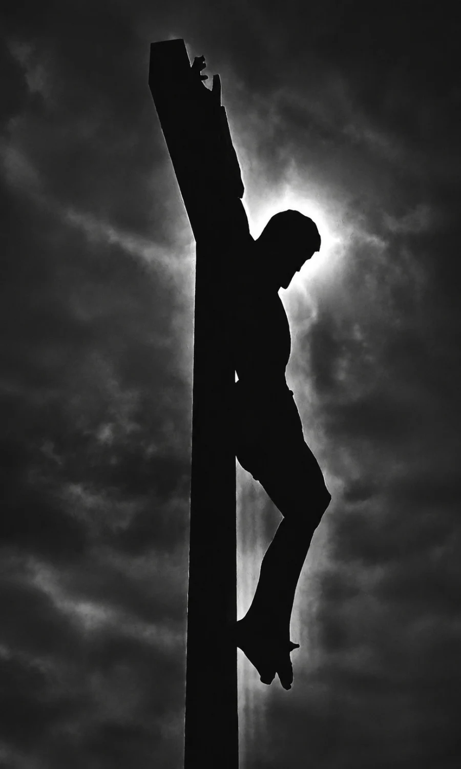 Andrew’s photograph of a crucifix silhouetted during the April 8, 2024 solar eclipse in Cardinal, Ontario